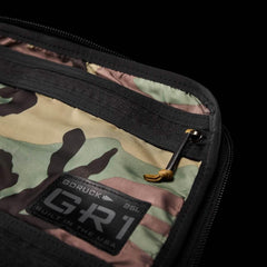 Close-up of GORUCK GR1 backpack interior featuring 26L capacity label and camouflage lining
