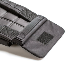 Close-up of a black padded strap with Velcro fasteners and reinforced stitching, designed for the RPC Long + 30LB (Long) Plate Bundle to provide ergonomic lumbar support, shown on a white background.