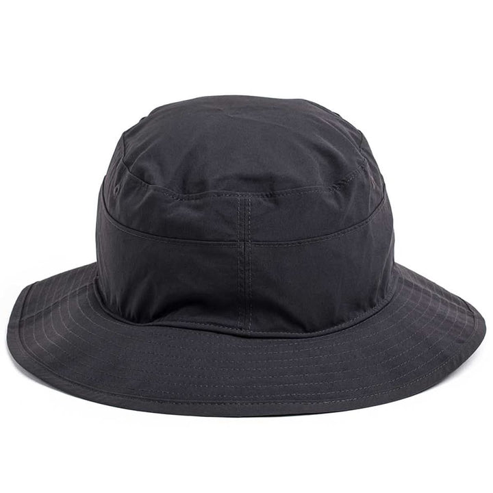 The Boonie Hat - Slick - ToughDry is a black hat made from ToughDry® fabric, offering a wide brim and visible stitching for excellent protection from the elements.