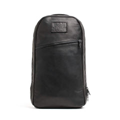 Black leather GORUCK Bullet 15L backpack with a diagonal front zipper pocket and embossed logo patch