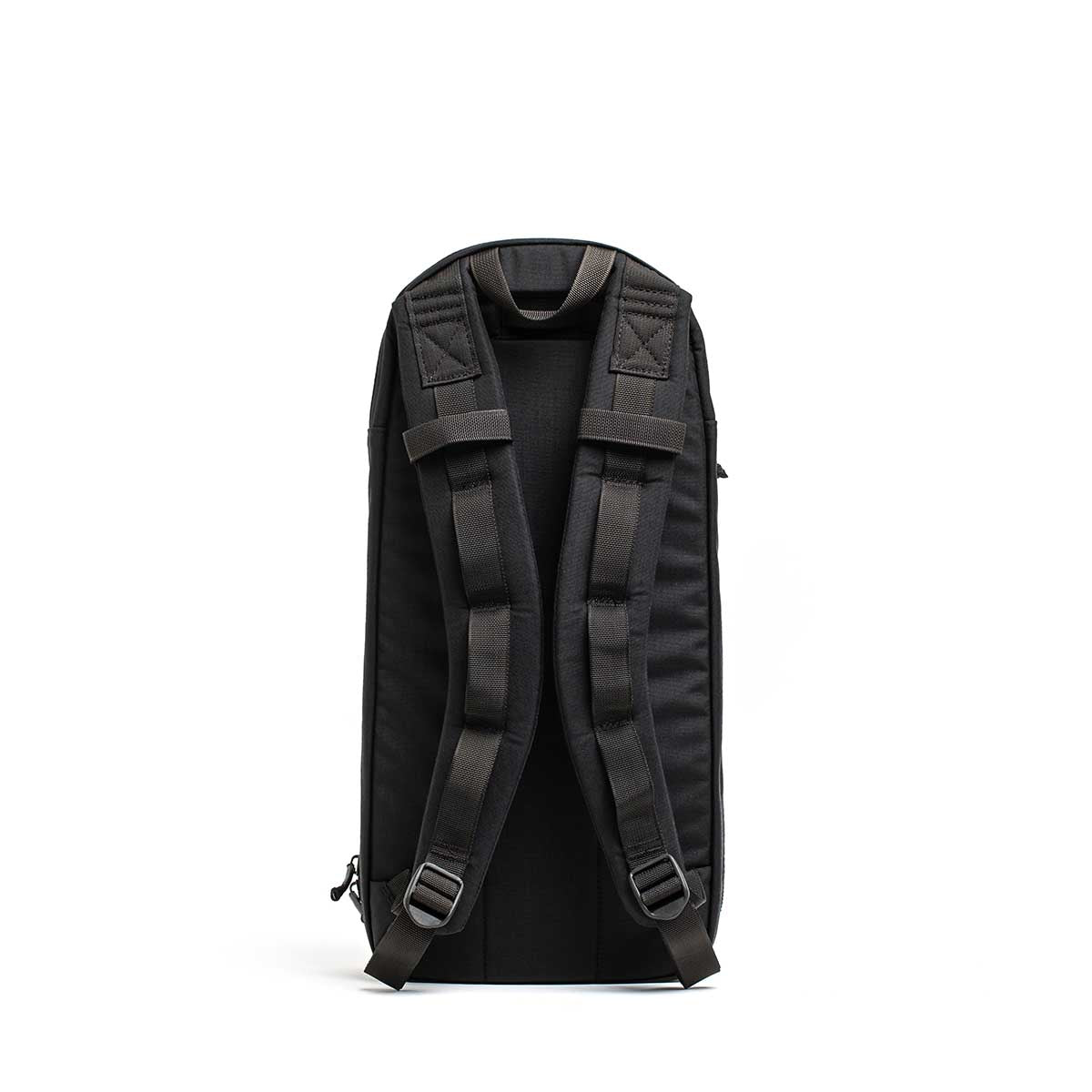 The Bullet Ruck USA Throwback daypack is shown from the back, highlighting its padded shoulder straps and durable CORDURA construction against a white background.