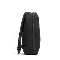 Side view of black GORUCK Bullet Ruck 10L backpack with durable straps and tactical design
