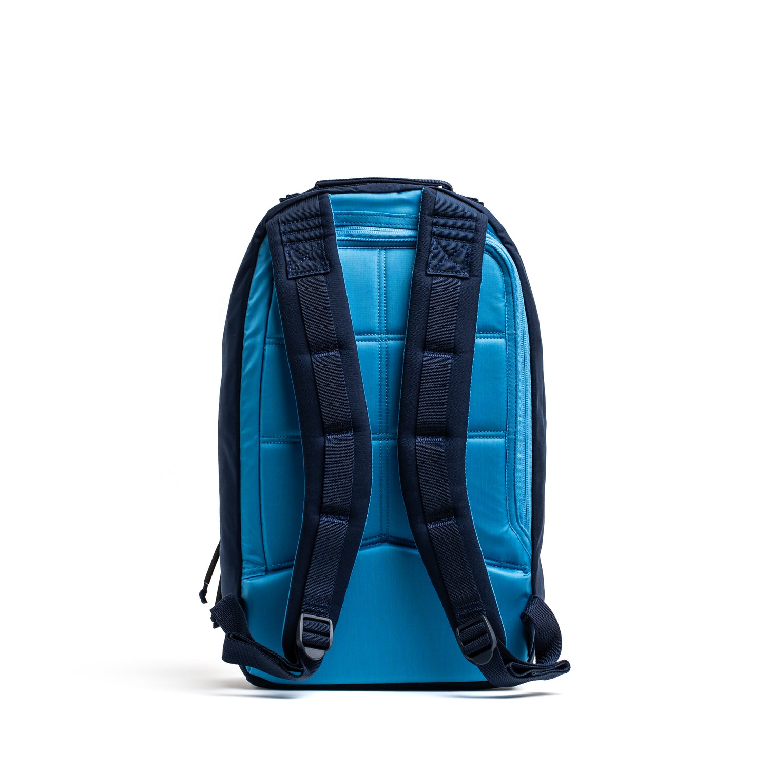The Bullet Ruck Classic - Ballistic Nylon Cordura is a blue streamlined backpack with padded straps, displayed from the back on a white background.