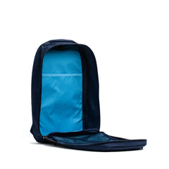 The Bullet Ruck Classic - Ballistic Nylon Cordura is a navy blue 15L daypack with a main compartment that opens to a light blue interior and convenient inner pockets.