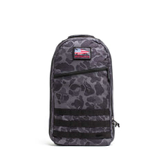The Bullet Ruck Laptop - 16L by GORUCK is a sleek black backpack that seamlessly combines style with functionality. It includes a zippered front pocket, two side zippers, and a top handle. Designed for everyday use, this durable backpack offers subtle lumbar support and comes equipped with a laptop compartment.