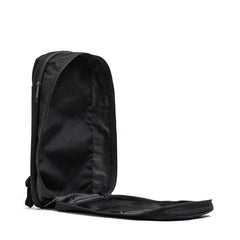 The Bullet Ruck USA Throwback daypack stands upright with its main compartment unzipped, showing off its durable CORDURA construction, displayed against a white background.