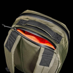 GORUCK Bullet Ruck 15L backpack in green Xpac fabric with black straps and orange interior lining