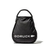 A black Sand Kettlebell with a heavy-duty padded handle and white logo stands upright on a white background.