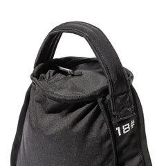 Close-up of the Sand Kettlebells bag in black fabric, showcasing a heavy-duty padded handle and the number "18" stitched in white on its side.