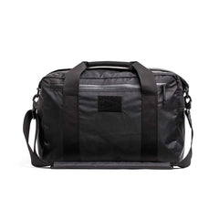 Kit Bag - X-PAC shown on a white background; features two handles, shoulder strap, front zipper pocket, and is made from durable X-PAC VX21 material.