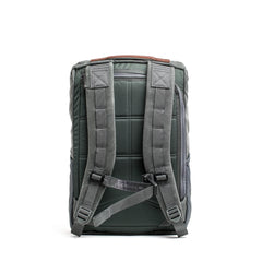 GORUCK slate gray rucksack backpack with padded straps and rugged design, rear view