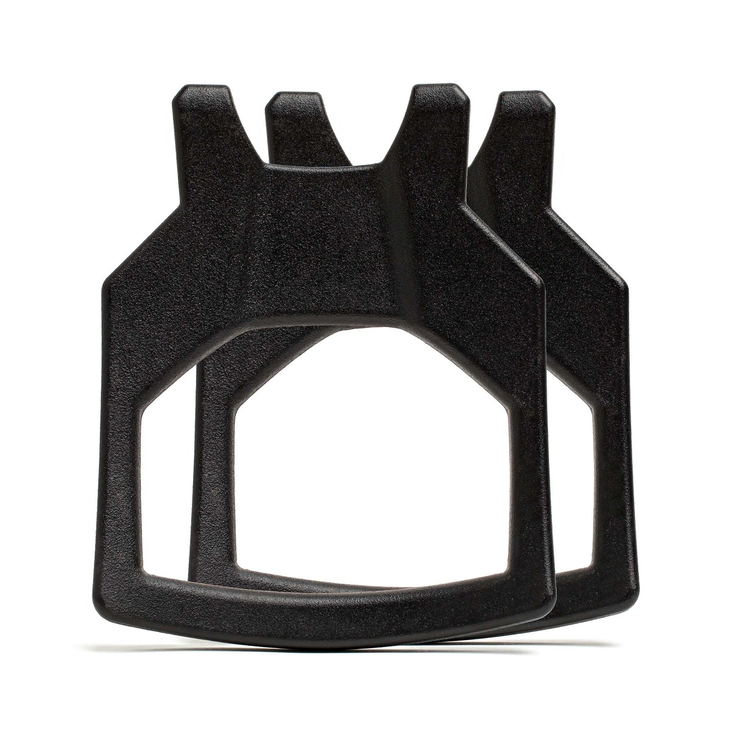 Two Curved Ruck Plates, black and resembling gear like a rucking weight vest, overlap and stand upright on a white background.