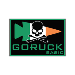 GORUCK Basic patch with black background, skull and crossed bones over Irish flag-colored ruck plate