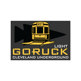 Logo featuring a streetcar, arrowhead, and "The Underground Ruck - Cleveland, OH," inspired by rucking events and the spirit of a GORUCK Challenge.