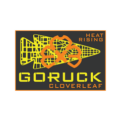 The 24 Hour Cloverleaf - Jax Beach Edition showcases an orange clover and yellow "HEAT RISING" text on a dark background—a bold emblem for rucking or endurance events in Jacksonville Beach.