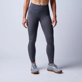 GORUCK women's gray high-waisted athletic leggings for rucking, shown with gray sneakers