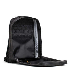 Black GORUCK durable rucksack open, showing organized interior compartments and mesh pocket