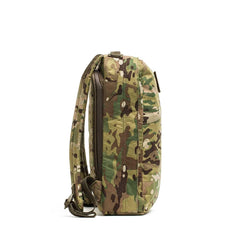 Side view of GORUCK backpack in Multicam camouflage pattern with padded shoulder straps