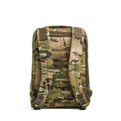 The GR0 - X-PAC is a lightweight, waterproof camouflage rucksack with padded shoulder straps, pictured from the back on a white background.