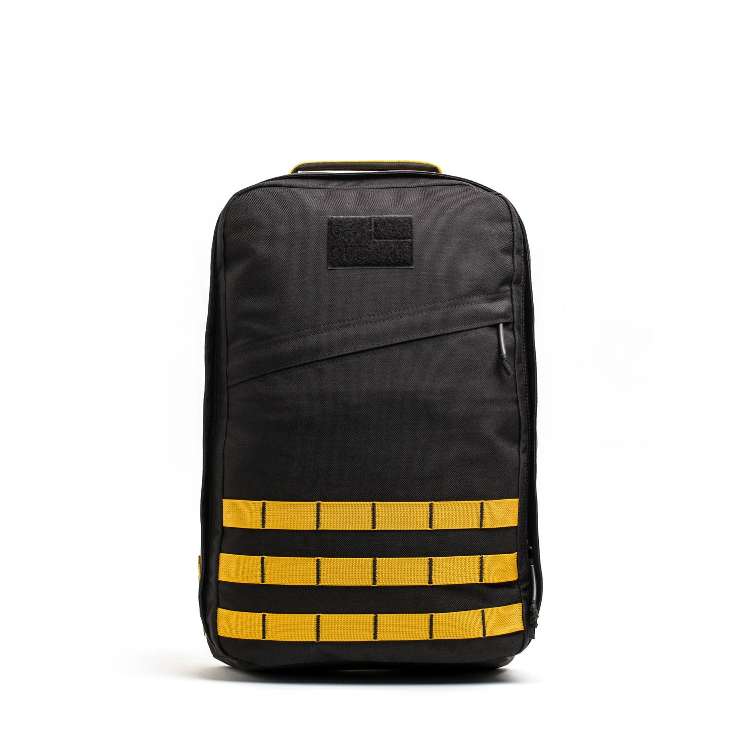 The GR1 rucksack backpack features yellow horizontal straps, a top handle, and is crafted from Special Forces grade materials, shown against a plain white background.