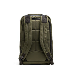 GORUCK dark green durable rucksack with padded back panel and adjustable shoulder straps, isolated on white