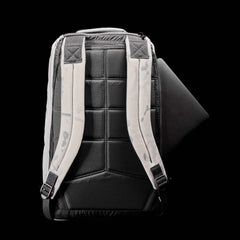 The GR1 rucksack, in black and gray, features padded straps and a side pocket for your laptop. Inspired by Special Forces backpacks, it’s built for durability.