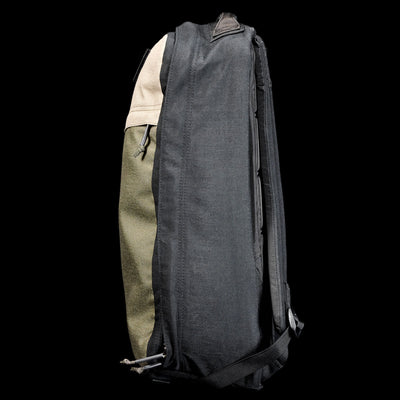 Side view of the GR1 Shooter 26L - Built by SCARS, showing black, green, and tan CORDURA® panels against a black background—engineered for durability by the SCARS team.