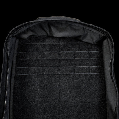 The spacious interior of the black GR1 Shooter 26L - Built by SCARS, made from rugged CORDURA®, has horizontal loop fastener strips—perfect for SCARS team needs or organized adventures.