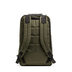 GORUCK dark green durable rucksack with padded back and adjustable shoulder straps on white background
