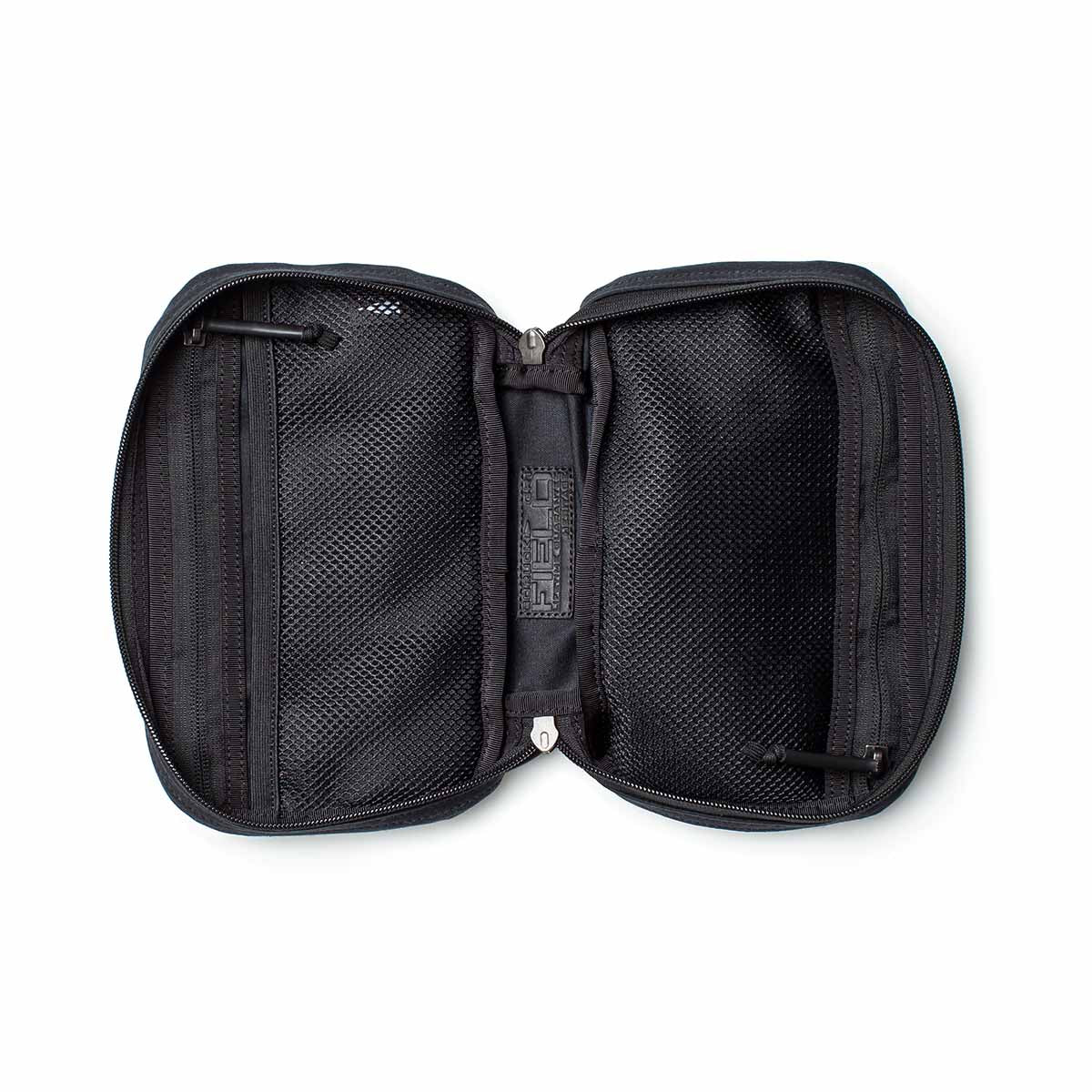 Open black zippered travel pouch with mesh pockets on both sides, empty and laid flat on a white background—ideal for organizing essentials or pairing with your GR1 Field Pocket - Waxed Canvas.