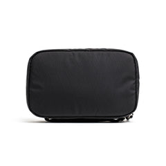 Black rectangular GORUCK Field Pocket made with durable XPAC fabric, isolated on white