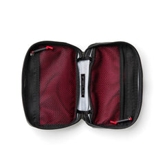 Open GORUCK Field Pocket in charcoal with red mesh interior pockets and durable zipper details