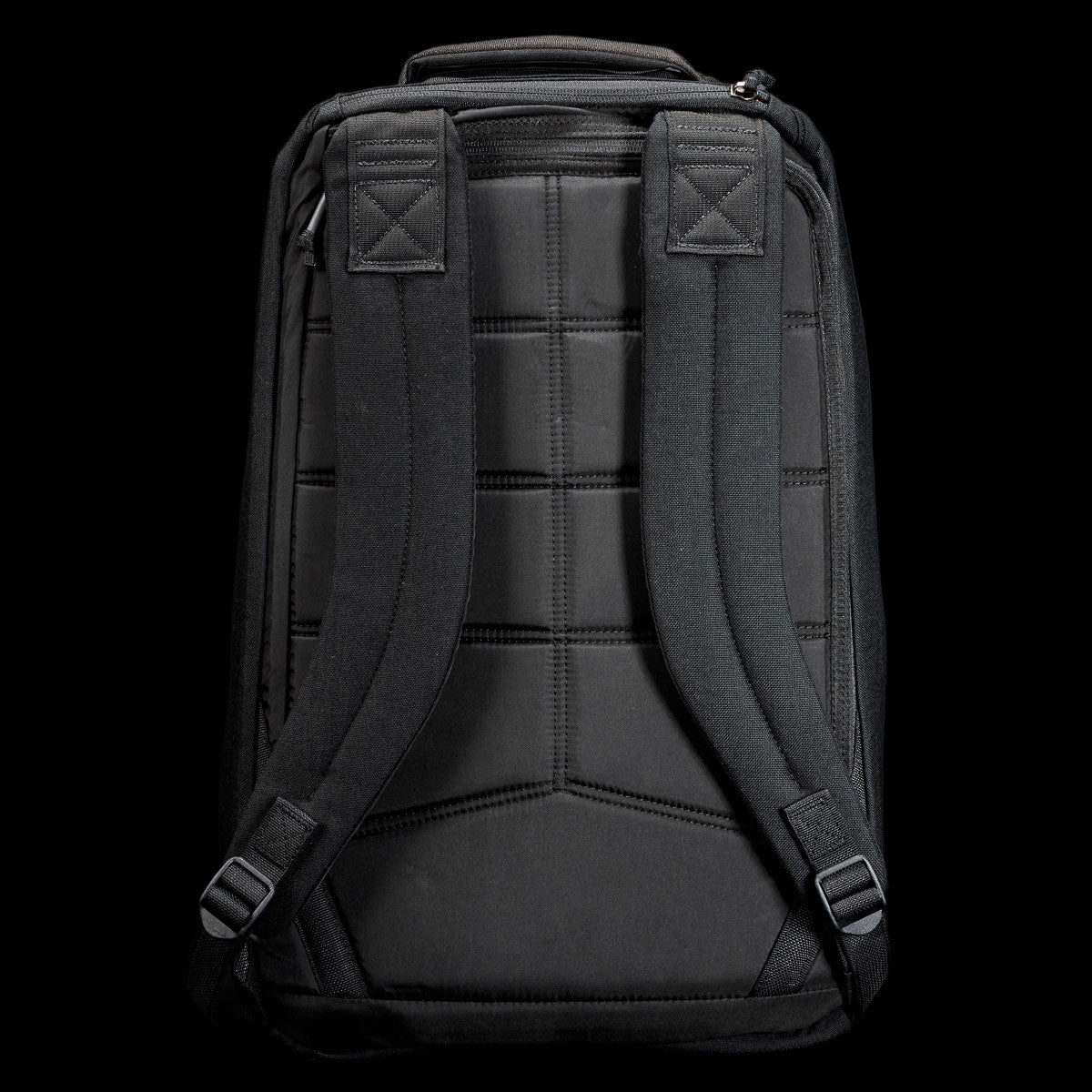 The GR1 Shooter 26L - Built by Scars backpack in black is shown from the back, featuring padded shoulder straps, visible stitching, and constructed from Special Forces Grade CORDURA® for outstanding durability.