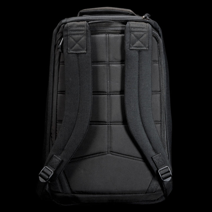 The GR1 Shooter 26L - Built by Scars backpack in black is shown from the back, featuring padded shoulder straps, visible stitching, and constructed from Special Forces Grade CORDURA® for outstanding durability.