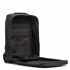 Open black GORUCK rucksack showing durable interior with organized compartments for tough rucking gear