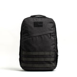 GORUCK GR1 21L black rucksack with MOLLE webbing, shown on white background