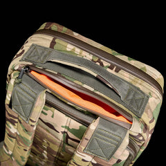 GORUCK backpack in Multicam camouflage fabric with reinforced straps and orange interior lining