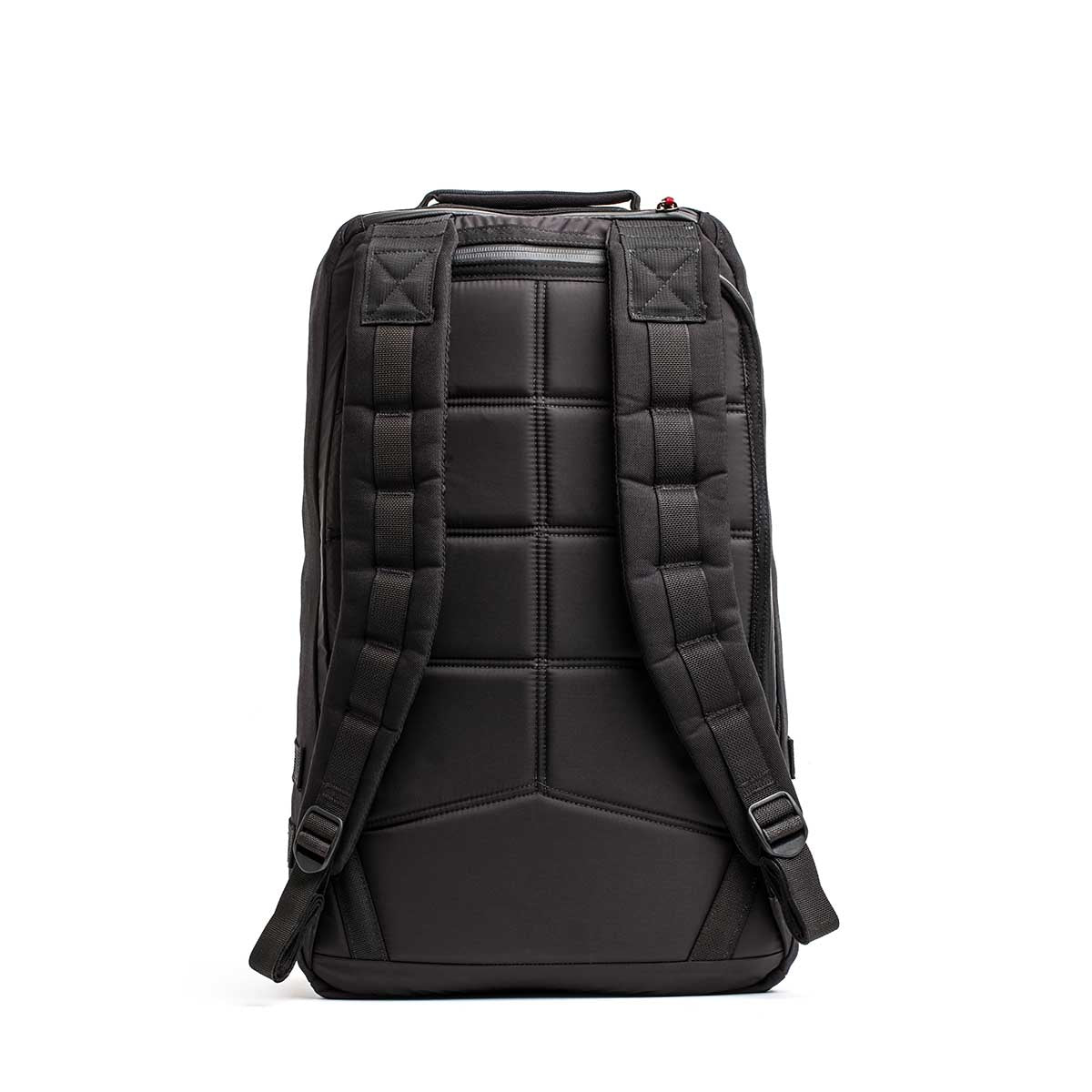 The 26L GR1 USA - GORUCK x Arnold's Pump Club backpack, shown from the back, features padded straps and a textured, cushioned back panel. This limited-edition pack is inspired by the classic GR1 rucksack.