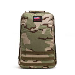 The GR1 USA - Cordura, an American-made camouflage rucksack, features a GORUCK patch and small American flag, making it stand out on a white background.