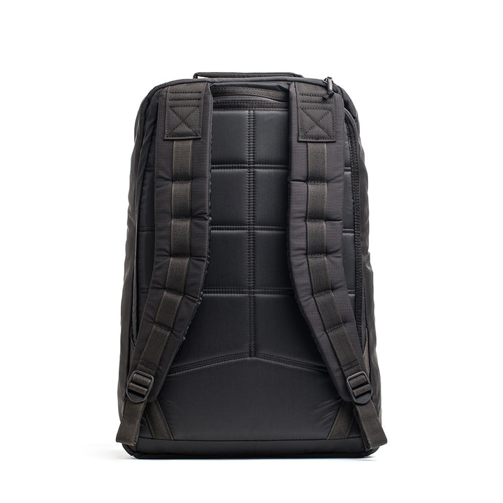 The GR1 USA - Ripstop ROBIC® is a black backpack made from ultra-lightweight ripstop nylon, featuring padded straps and a quilted back panel, shown standing upright on a white background.