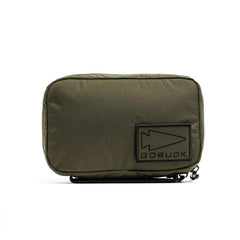 GORUCK Field Pocket in dark green XPac fabric with black GORUCK patch and dual zipper pulls