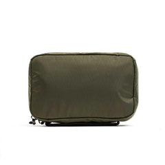 GORUCK Field Pocket in slick dark green made from durable XPAC fabric, compact and rectangular pouch