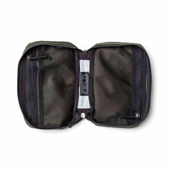 Open GORUCK Field Pocket in dark green with black mesh compartments and dual zipper pouches