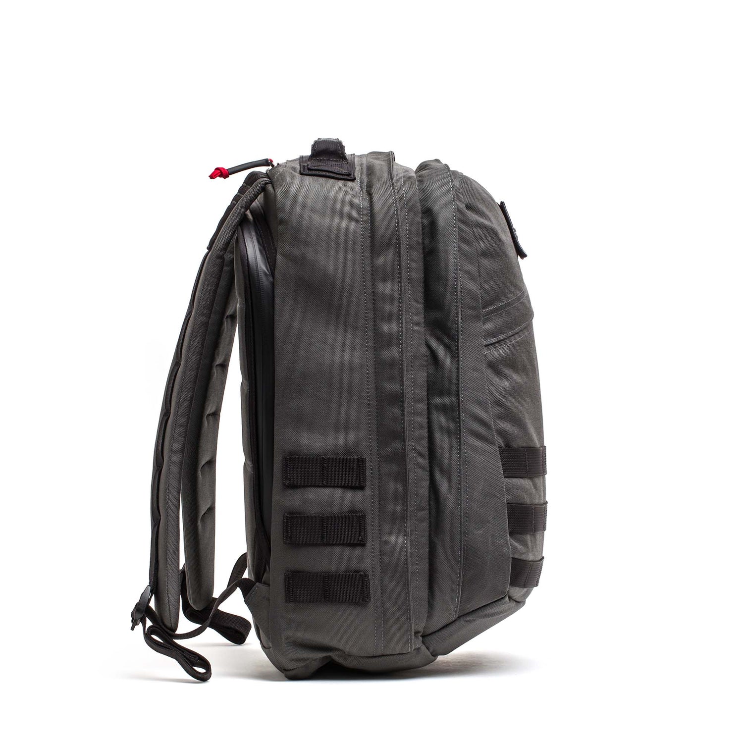 Side view of a gray GR2 - Cordura ruck with padded straps and horizontal webbing loops, perfect as a Special Forces backpack or carry-on travel bag.