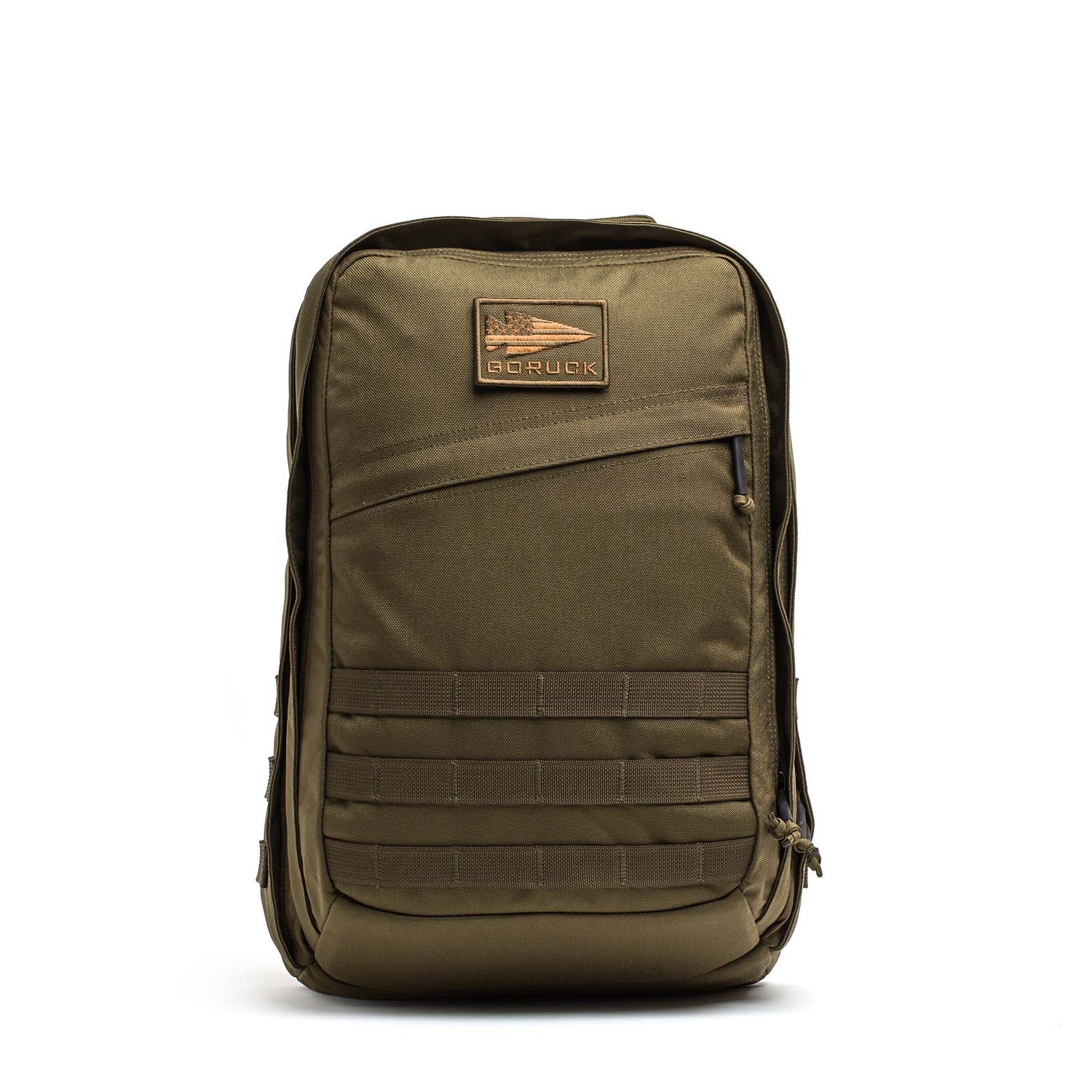 The GR2 - Cordura backpack, inspired by Special Forces rucksacks, comes in olive green and features a front zipper, patch, and multiple rows of webbing on the lower front.