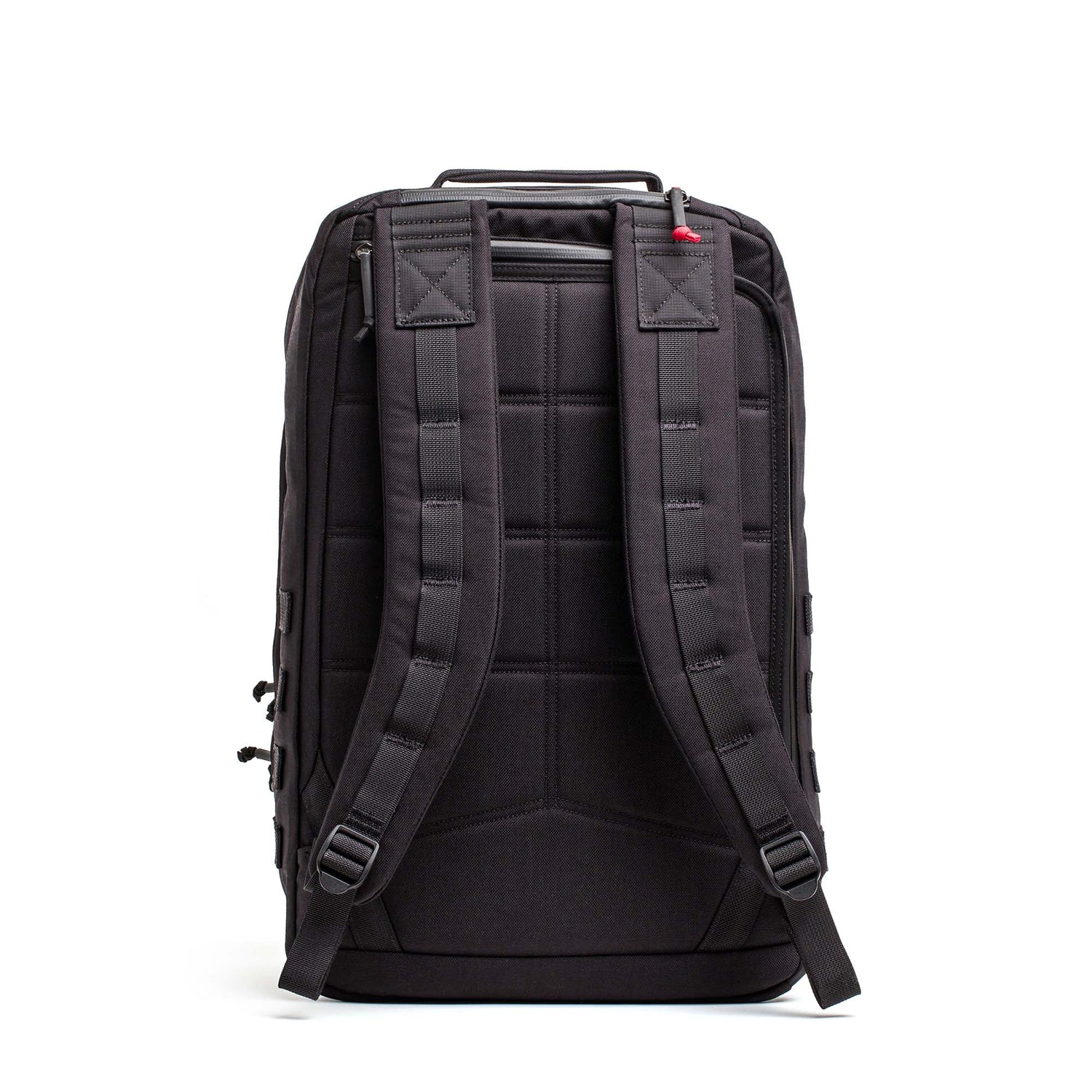 The GR2 - Cordura in black is shown from the back with padded shoulder straps and a top handle—a tough carry-on travel bag inspired by Special Forces backpacks.