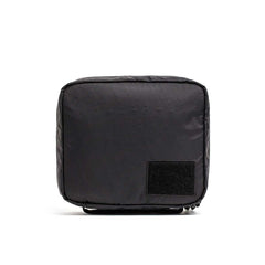 The GR2 Field Pocket - X-PAC is a black, square waterproof pouch with a front Velcro patch, perfect for organizing electronics, displayed on a white background.