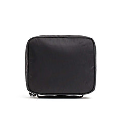 The GR2 Field Pocket - X-PAC is a black, square travel pouch with a small strap, made from waterproof fabric and AquaGuard zippers, displayed on a white background.