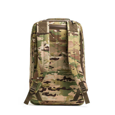 The GR2 X-PAC backpack features a camouflage X-PAC material, padded shoulder straps, and AquaGuard zippers; it's displayed standing upright on a white background.