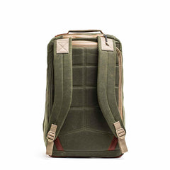 GORUCK 34L Waxed Canvas backpack in olive field with tan straps, padded back, and durable design